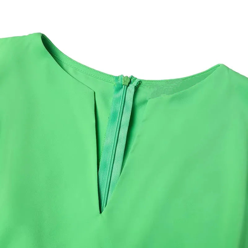 Chic women's solid colour jumpsuit, showcasing a stylish loose fit design for a luxurious summer look.