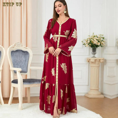 Sophisticated Moroccan abaya presented in a flowing silhouette, designed with short bat sleeves and a stunning golden hue for a regal appearance.