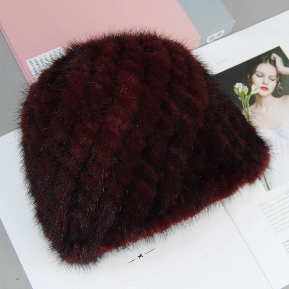 Beautifully crafted Women's Luxury Mink Faux Fur Beanie displayed against a soft backdrop, highlighting its premium quality and stylish appeal.