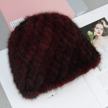 Beautifully crafted Women's Luxury Mink Faux Fur Beanie displayed against a soft backdrop, highlighting its premium quality and stylish appeal.