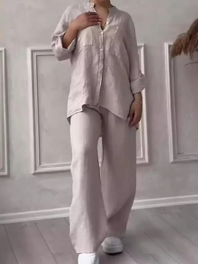 Elegant women's 2 piece outfit showcasing a stylish long sleeve pullover shirt and comfortable wide-leg trousers for a chic casual look.