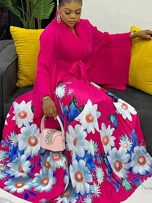 Luxury plus size 2-piece skirt set featuring a stylish batwing sleeve top and elegant pleated print skirt, perfect for autumn parties.