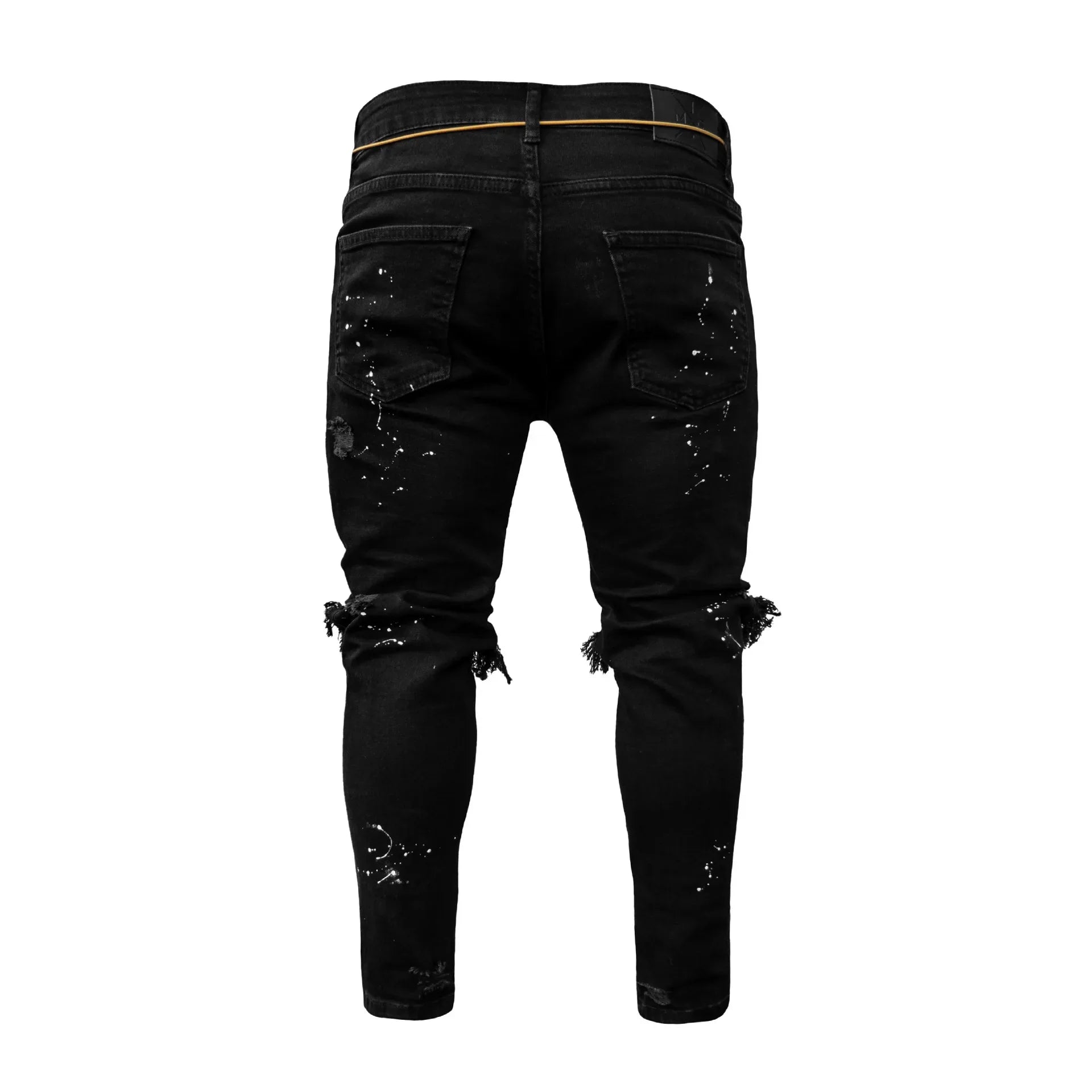 Close-up of high-quality skinny cargo pants for men, showcasing the luxurious denim fabric and intricate hollow-out decoration.