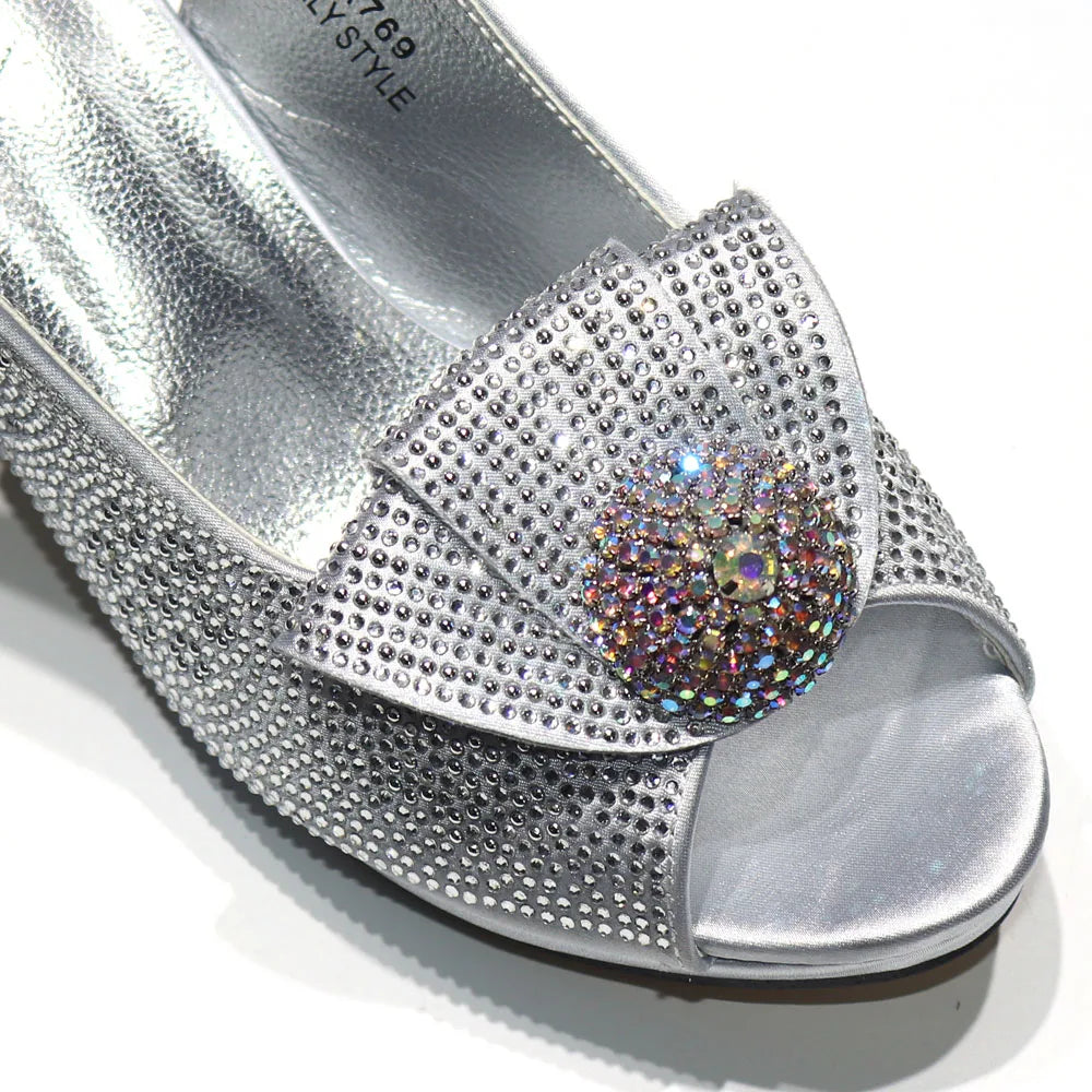 Close-up of Venus Chan Italian wedding shoes, showcasing exquisite diamond embellishments on high spike heels.