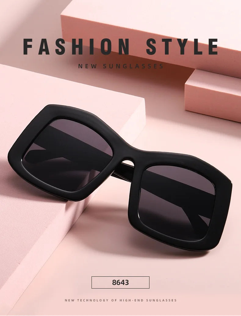 Stylish women's sunglasses with a unique square frame and gradient orange lenses, crafted from high-quality polycarbonate material.