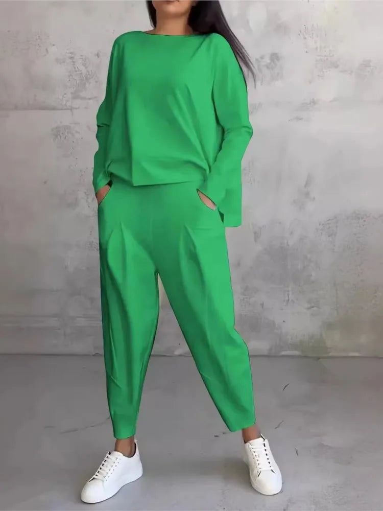 Stylish high waist harem pants from the women's casual sports set, designed for comfort and crafted with soft polyester material, ideal for a chic yet relaxed look.