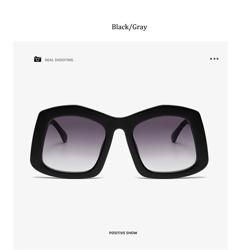 Chic gradient orange oversized square women's sunglasses, designed by Reboto, offering luxury and UV400 protection for a sophisticated look.