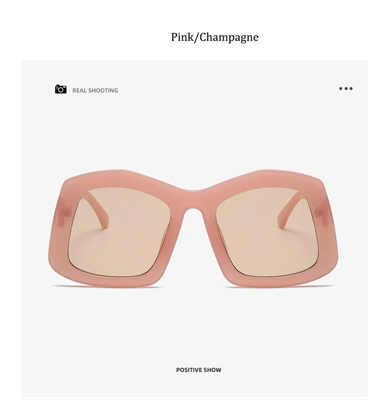 Stylish women's oversized orange sunglasses showcasing a chic square design with UV400 lenses, designed for elegance and sun protection.