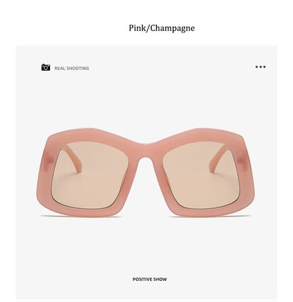 Stylish women's oversized orange sunglasses showcasing a chic square design with UV400 lenses, designed for elegance and sun protection.