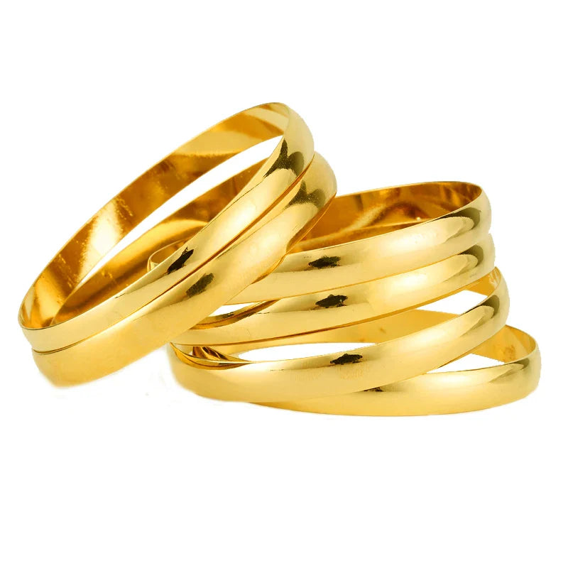 Luxurious 8mm gold bangle set featuring six exquisite Dubai-style cuffs, perfect for both men and women, crafted for elegant African and Arabian occasions.