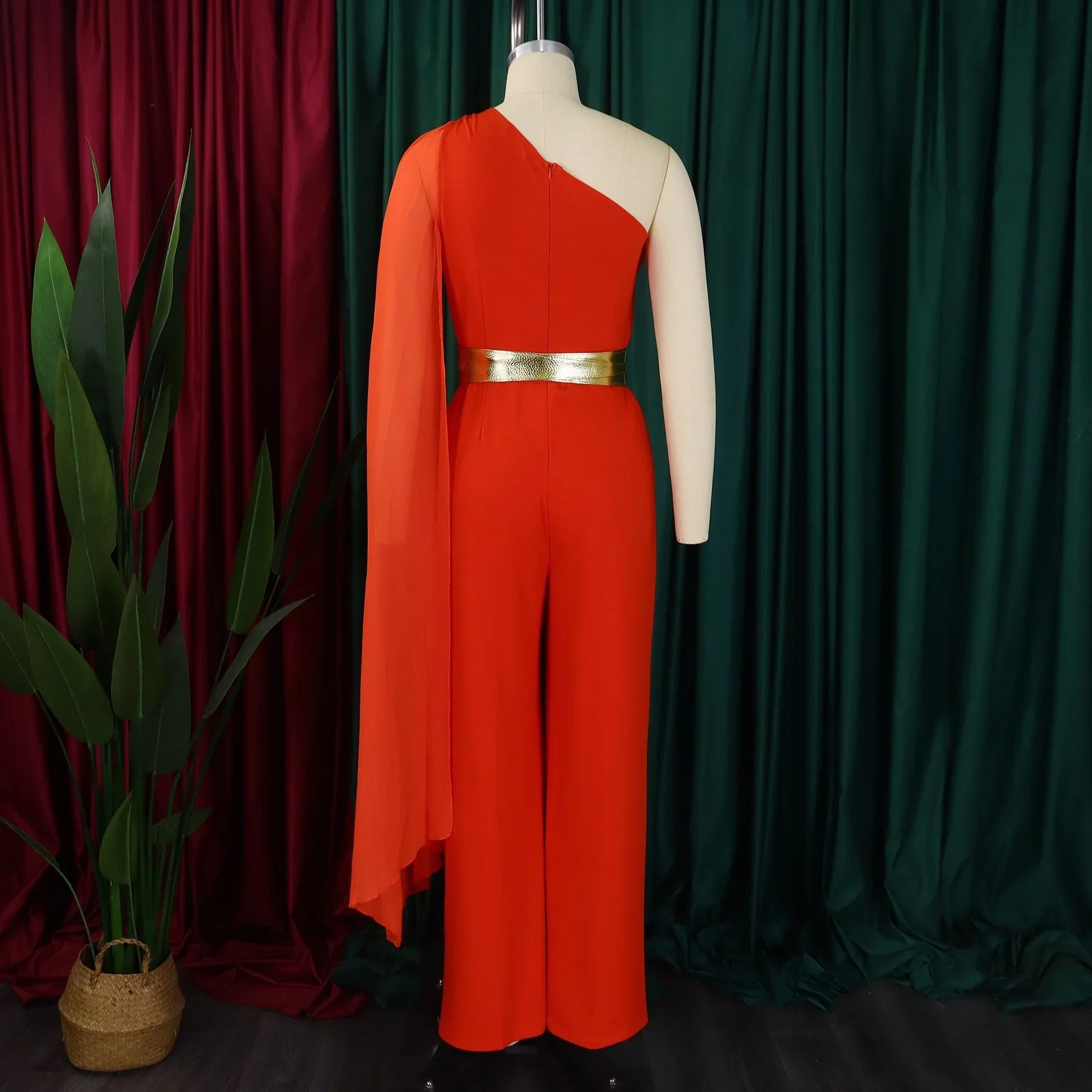 Versatile women's romper with high waist design and elegant flying sleeves, exemplifying contemporary fashion for the modern woman.