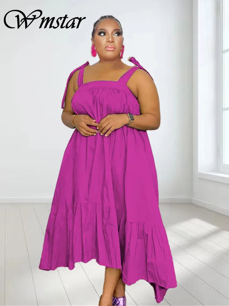 Elegant Wmstar Plus Size Maxi Dress for Women, featuring a solid design, ankle-length, and a flattering sleeveless silhouette, perfect for summer occasions.