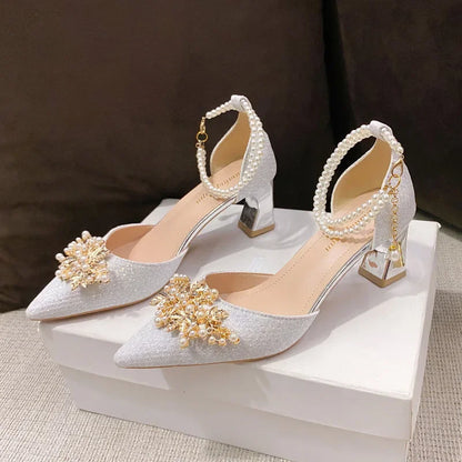 Luxury women's high heels featuring a pointed toe and elegant metal beaded design, perfect for summer weddings and banquets.