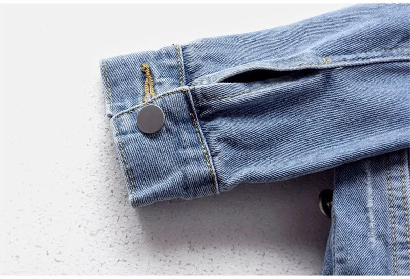 Luxury women's loose denim jacket in elegant casual style with long sleeves and button closure, perfect for ages 35-45.