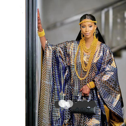 Elegant presentation of the Luxury African Dashiki Bubu Dress in Rich Blue with Stones, representing traditional African style.