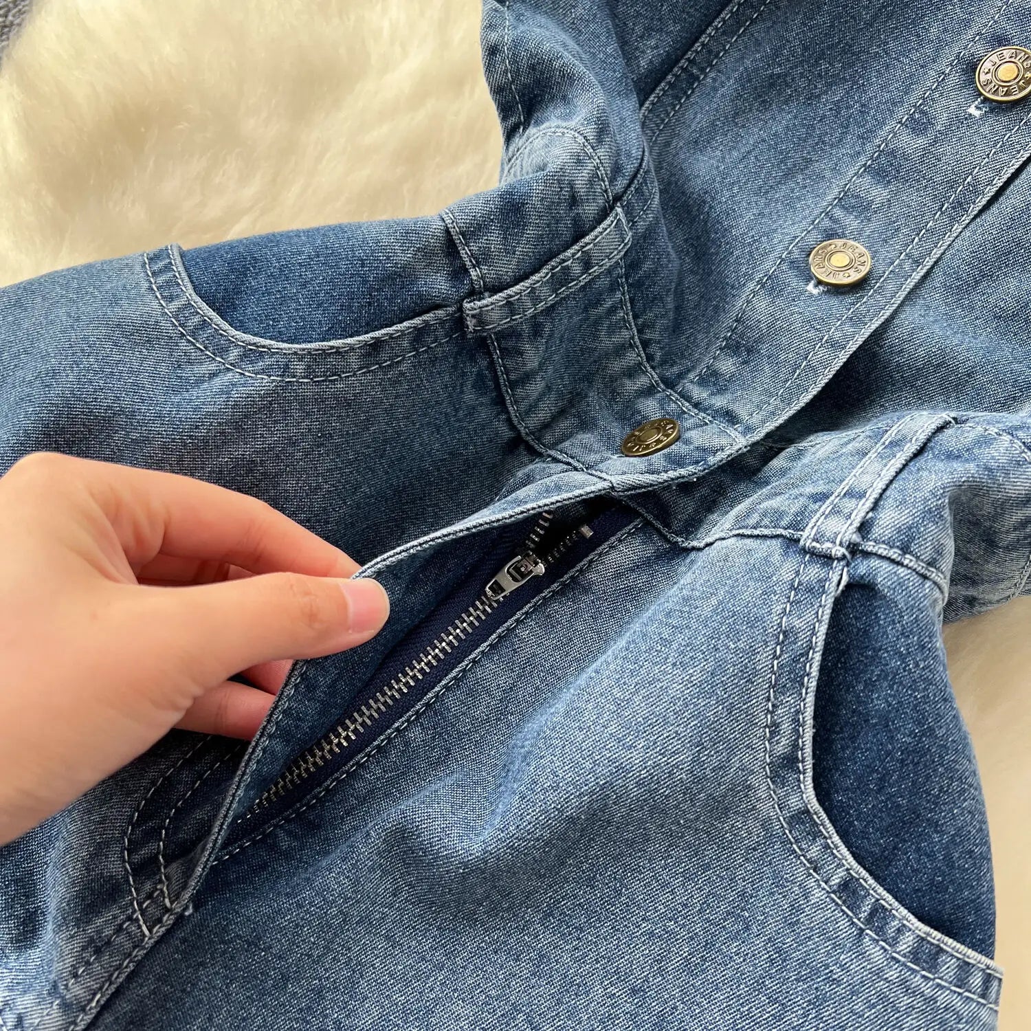 Sophisticated close-up of WTHT Women's Denim Dress showcasing ruffled edges and a stylish O-Neck, ideal for chic middle-aged women.