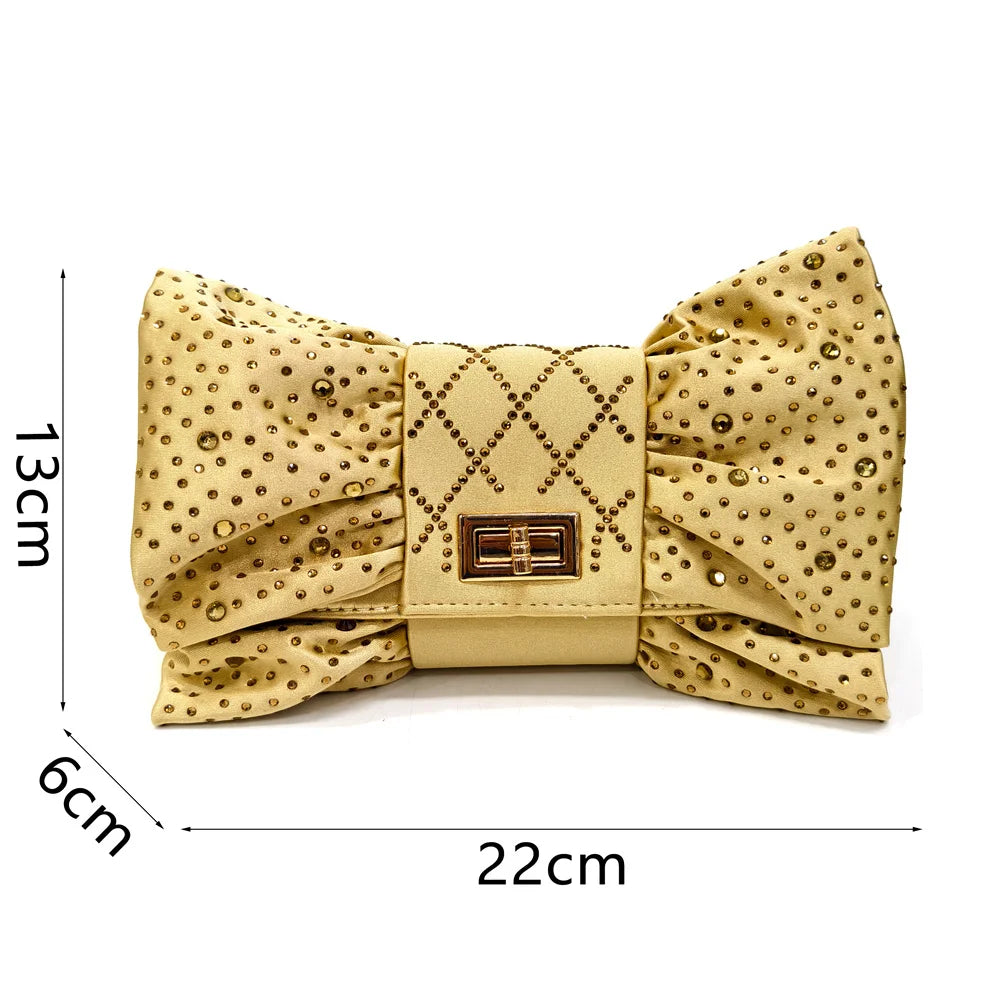 Stylish matching set of wine colour heeled shoes and handbag, ideal for weddings and upscale parties.