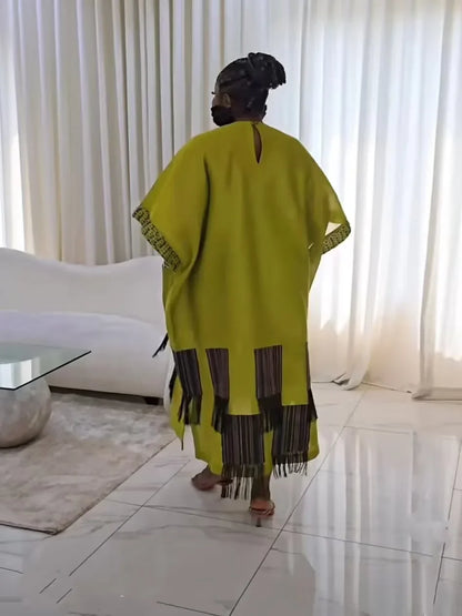 Exquisite one-size-fits-all African clothing showcasing traditional flair, combining luxury and comfort in a vibrant design, perfect for any wardrobe.