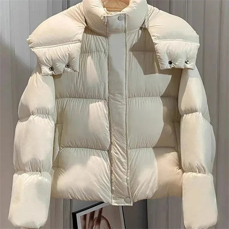 Elegant cotton padded jacket for women, designed with solid colour and practical pockets, ideal for casual wear.