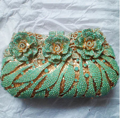 Refined metallic evening clutch purse for women, adorned with rhinestones and designed for upscale parties and celebrations.