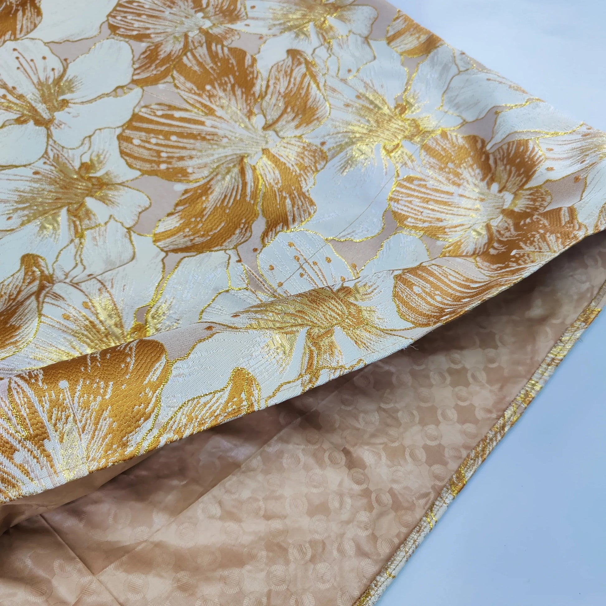 Elegant portrayal of an African dashiki dress for women, adorned with intricate brocade details, ideal for traditional celebrations.