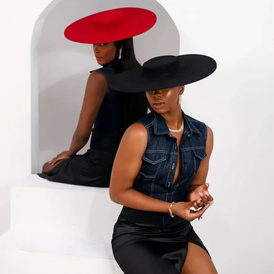 Luxury black wool fedora hat for women, featuring a wide brim and flat top, perfect as a stylish fashion accessory for any season.