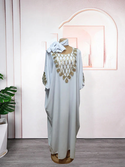 Elegant boubou robe djellaba for women, featuring rich African textile patterns, ideal for special occasions and formal events.