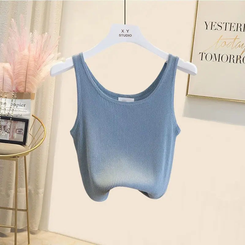 Model wearing a refined women's long sleeve striped shirt and wide leg jeans set, exemplifying elegant casual fashion for middle-aged women.