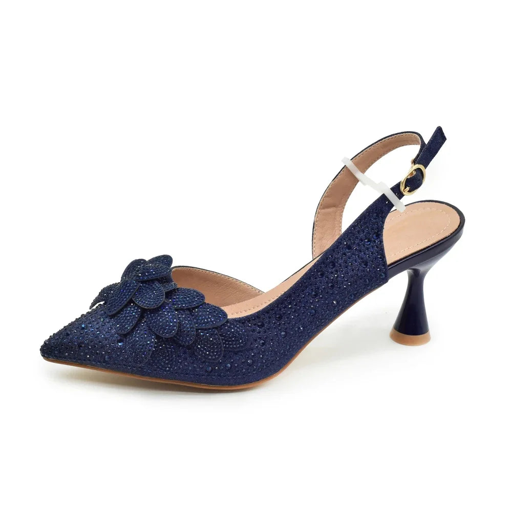 Dazzling display of the luxury women's Italian shoe and bag set, featuring super high spike heels and an opulent bag, perfect for parties and weddings.