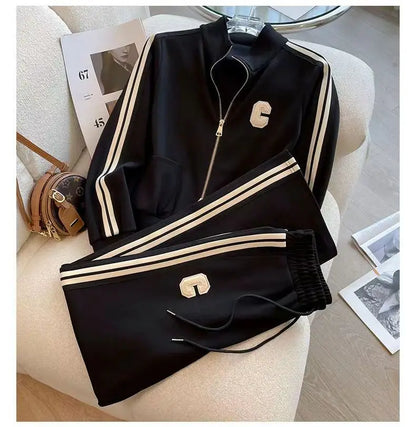 Elegant two-piece sports ensemble for women featuring wide leg pants paired with an exquisite embroidered coat, designed for comfort and luxury during the autumn winter season.