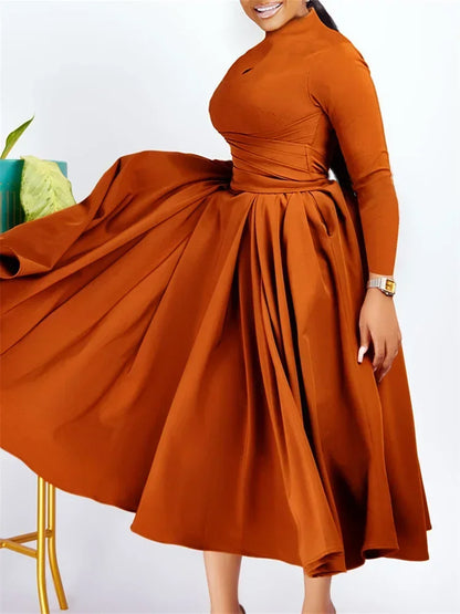 Close-up of the Wmstar Plus Size Women's African Dress, emphasising the attractive silhouette and luxurious fit for a confident look.