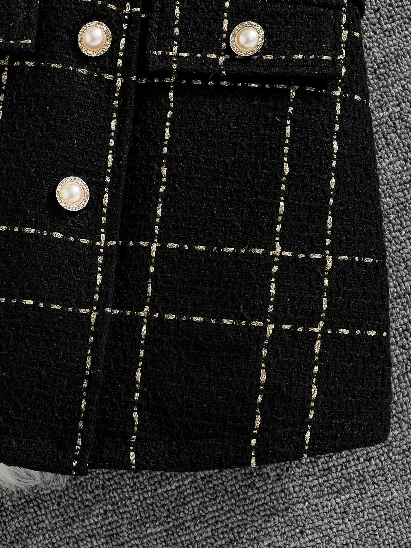 Charming plaid skirt of the girls' ceremonial dress set designed for young girls, epitomising elegance and sophistication.