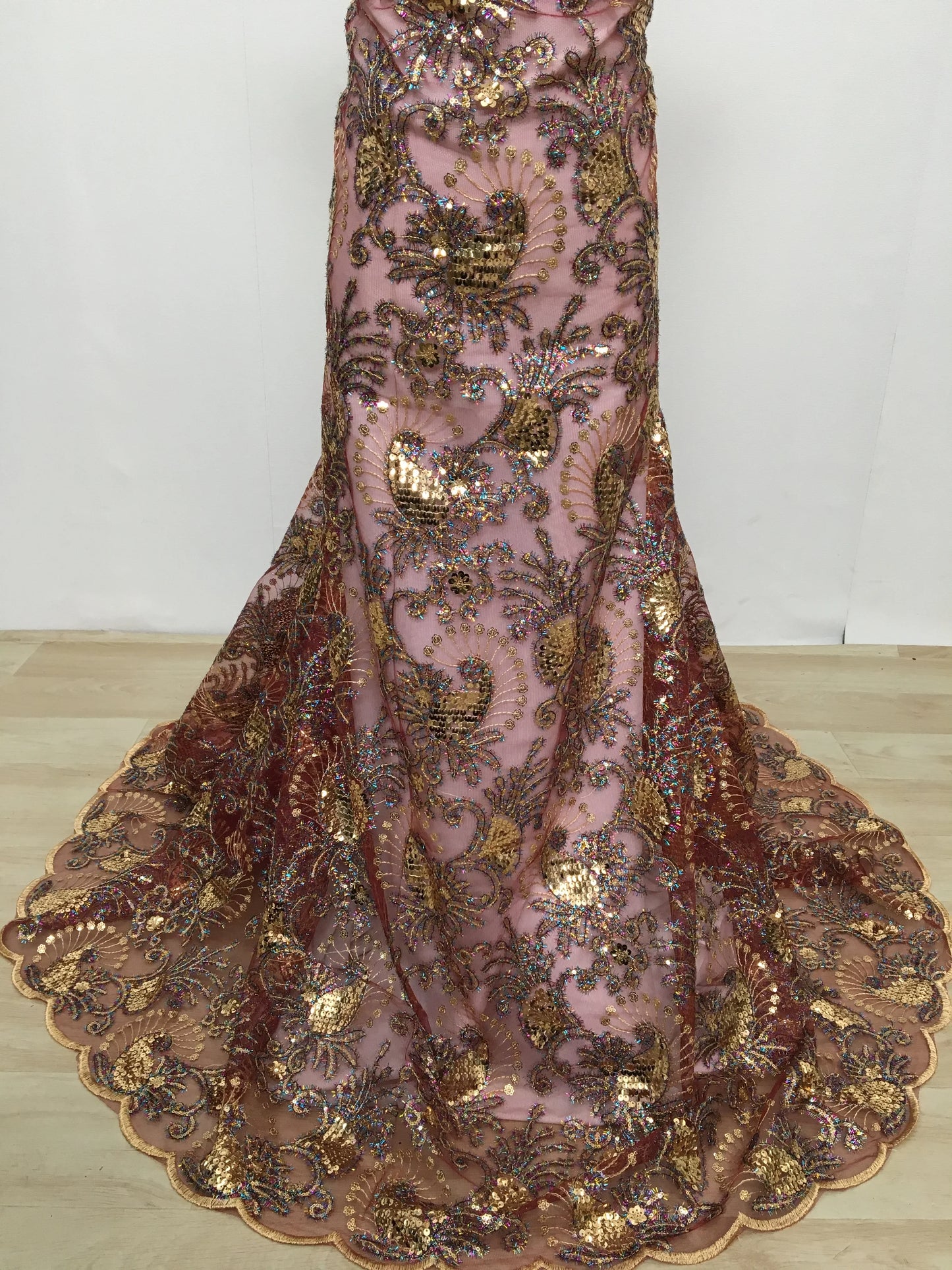 Stylish display of Kalume lace fabric, combining eco-friendly polyester-cotton material with intricate braided technics for luxury garments.