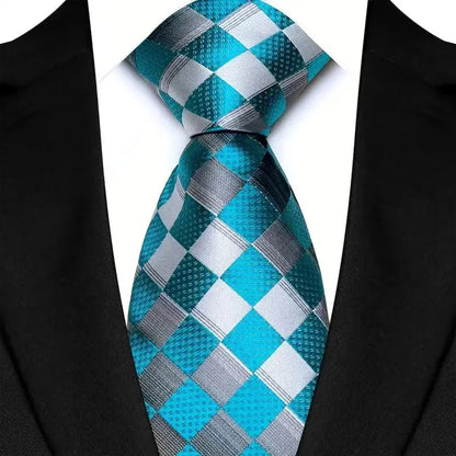 Chic neck tie in a distinctive green and blue pattern, embodying a modern fashion statement for the discerning gentleman.