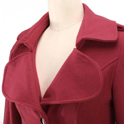 Sophisticated close-up of the stylish single button closure and turn-down collar of a women's woolen trench coat, showcasing high-quality craftsmanship.