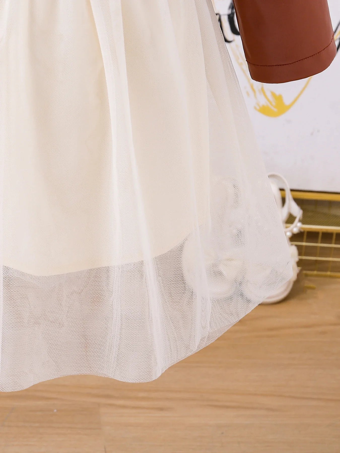 Exquisite girls' autumn dress ensemble with an opulent princess-like skirt and trendy PU leather vest, designed for ages 4-6.