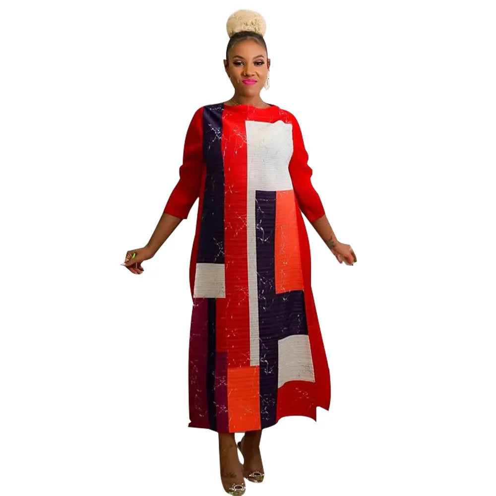 Elegant African plus size O-neck pleated long dress in vibrant colours, showcasing 3/4 sleeves, perfect for traditional and stylish occasions.