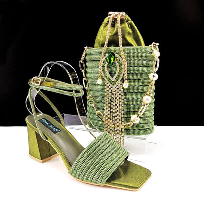 Sleek olive green handbag matching the high heel peep toe pumps, featuring rhinestone embellishments for a glamorous look.
