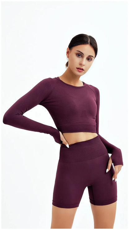 Elegant WAREBALL women's yoga outfit in chic pink, showcasing a seamless design ideal for both comfort and style during workouts.