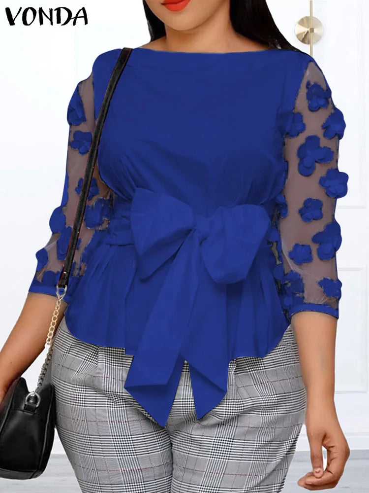 Chic three-quarter sleeve blouse designed for women, showcasing a modern crew neck and luxurious floral accents, suitable for all-season wear.