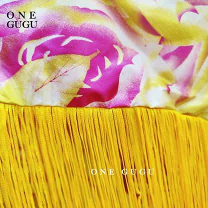 Side angle of the Luxury African Dashiki Wedding Dress in Blue Bazin Riche, demonstrating the elegant silhouette and vibrant colour, perfect for festive occasions.