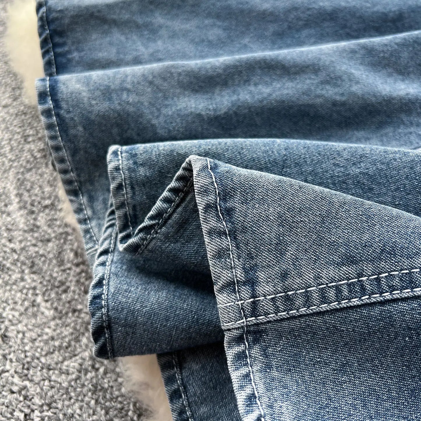 Distinctive back view of WTHT Women's Denim Long Dress highlighting its refined silhouette and pleated details, perfect for autumn gatherings.