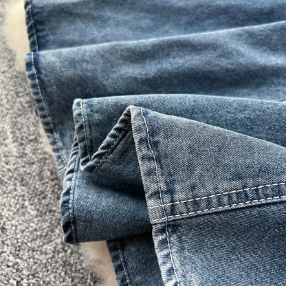 Distinctive back view of WTHT Women's Denim Long Dress highlighting its refined silhouette and pleated details, perfect for autumn gatherings.