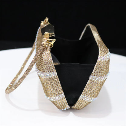 Sophisticated Venus Chan matching bag set with a long chain shoulder strap, designed to perfectly complement the black heels for a coordinated look.