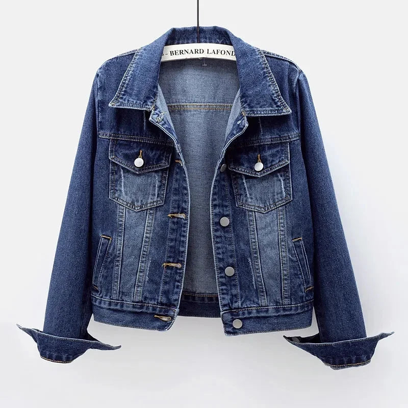 Luxury women's loose denim jacket with long sleeves and a casual button overcoat design, perfect for ages 35-45. Available in sizes up to 5XL, crafted from polyester and cotton, showcasing a solid pattern ideal for spring and summer.