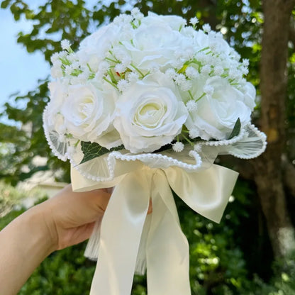 Beautiful wedding bouquet crafted from silk, embellished with baby's breath and exquisite pearl lace, perfect for brides.