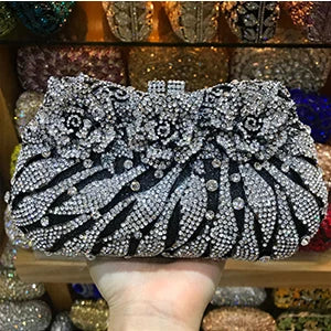 Chic solid design of a woman's evening clutch bag featuring exquisite rhinestone details, ideal for upscale events.