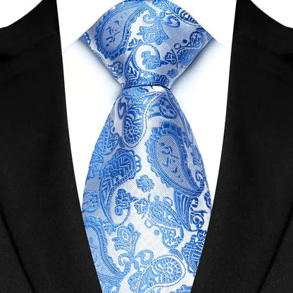Luxurious woven floral jacquard tie with vibrant green and blue tones, perfect for modern gentlemen.