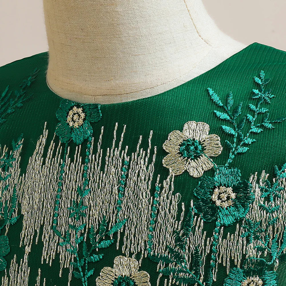 Lovely girls' evening dress with a floral design, crafted for comfort and style, an exquisite choice for any upscale gathering.