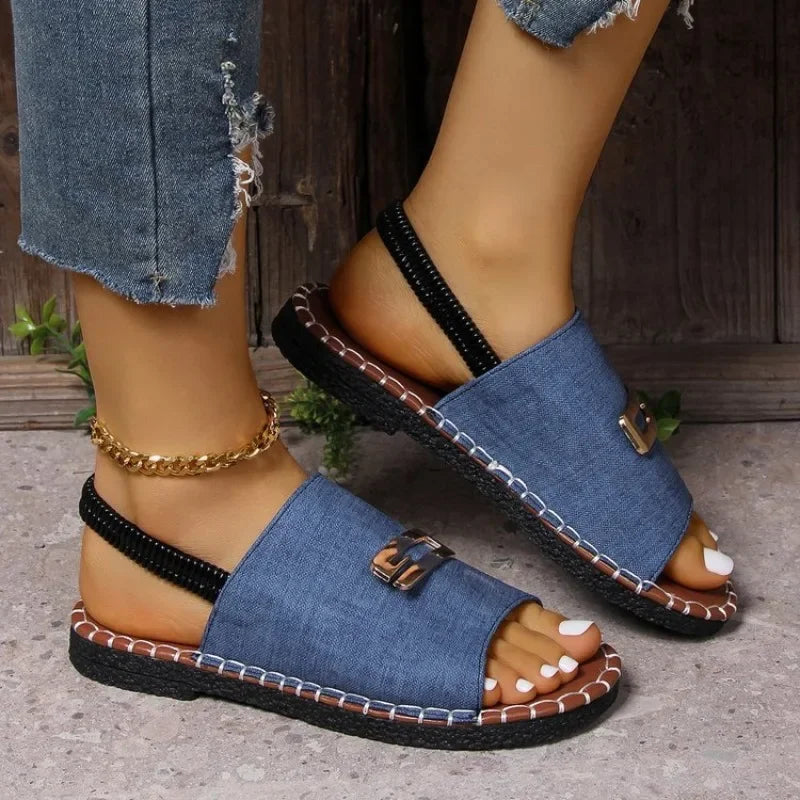 Stylish PU upper material flat sandals for women, showcasing a chic back strap and innovative elastic band closure, ideal for summer aesthetics.